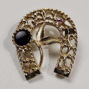 Vintage gold-tone flower horseshoe arch brooch pin